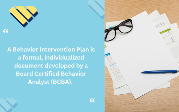 Behavior Intervention Plan definition beside paperwork, eyeglasses and a pen on a wooden desk.