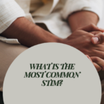 Seated person with hands clasped beside the text “What is the most common stim?”